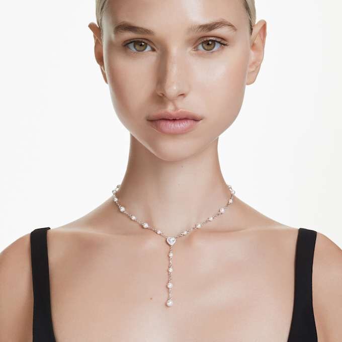 Κολιέ Ariana Grande X Swarovski Y με μικτή κοπή, κρυστάλλινο μαργαριτάρι, καρδιά, λευκό, επιροδιωμένο Κολιέ Ariana Grande X Swarovski Y με μικτή κοπή, κρυστάλλινο μαργαριτάρι, καρδιά, λευκό, επιροδιωμένο